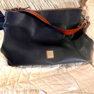 Dooney Bourke large black with tan and gold hardware
